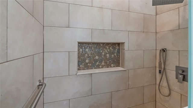 room details with a tile shower