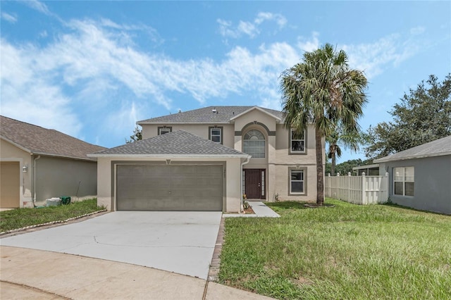 view of front of home with a garage and a front lawn