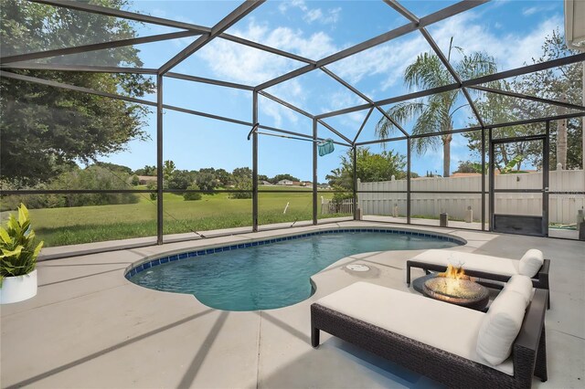 view of pool featuring a lanai and a patio area