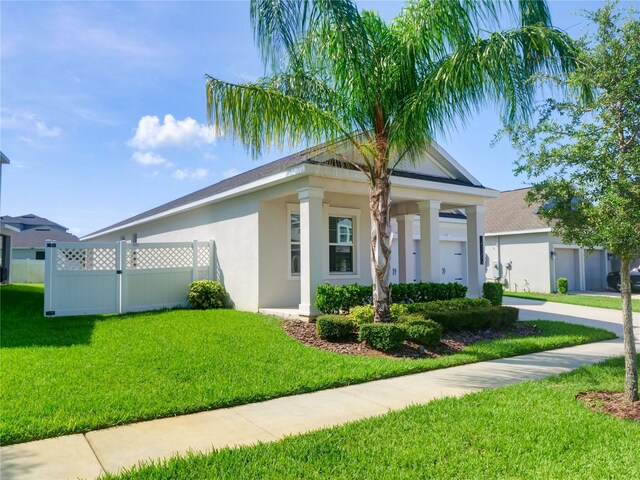 view of front of home with a front lawn