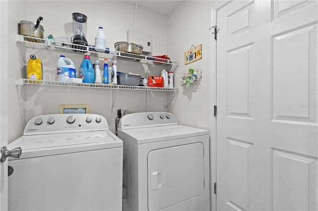 laundry room with washer and clothes dryer