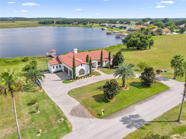 drone / aerial view with a water view