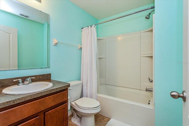 full bathroom with vanity, toilet, tile patterned flooring, and shower / bath combo with shower curtain