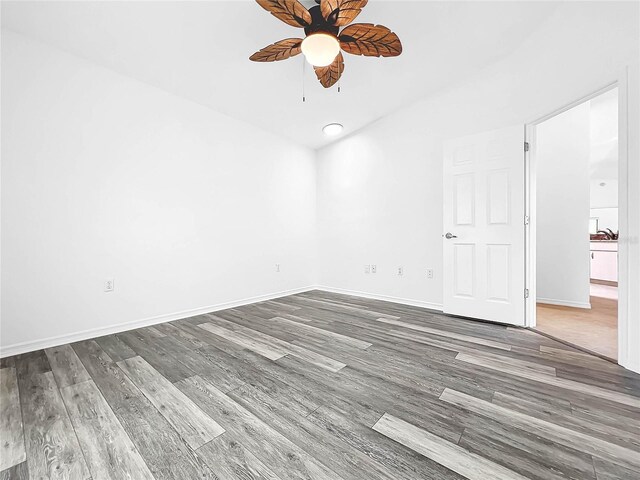 unfurnished room featuring wood-type flooring and ceiling fan