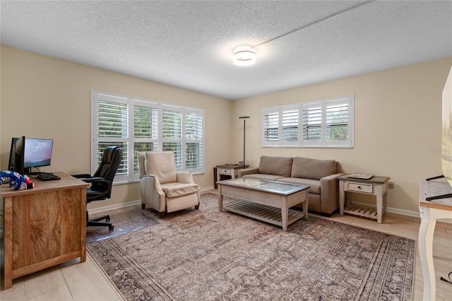 home office with a textured ceiling