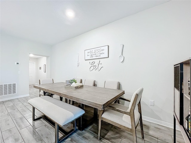 dining room featuring light hardwood / wood-style floors