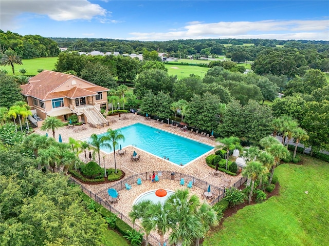 view of pool with a deck and a patio