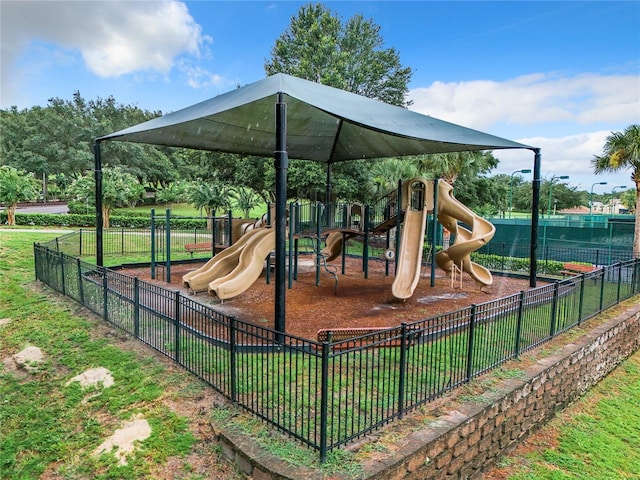 view of jungle gym featuring a yard