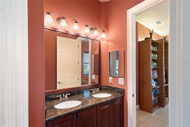 bathroom featuring tile patterned floors and vanity