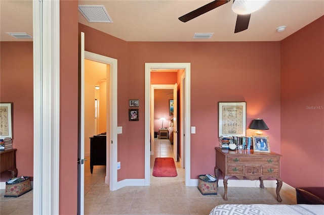 bedroom with light tile patterned floors