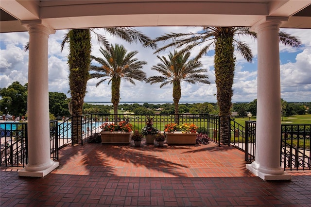 view of patio featuring a balcony