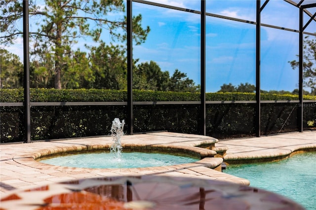 view of pool with pool water feature