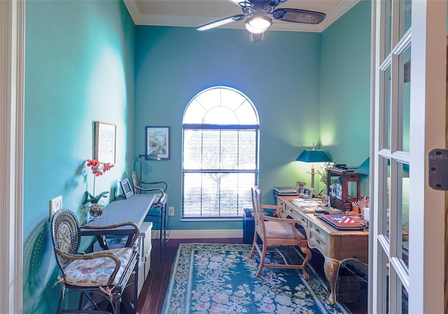 home office featuring ceiling fan, ornamental molding, and dark wood-type flooring