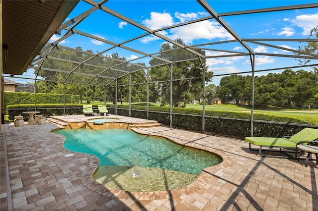 view of swimming pool with a patio area, an in ground hot tub, and glass enclosure