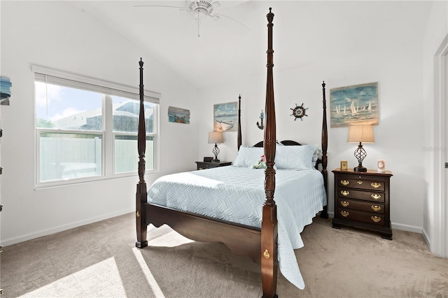 bedroom featuring ceiling fan, high vaulted ceiling, and light carpet