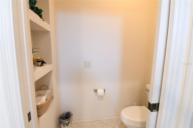 bathroom featuring tile patterned floors and toilet