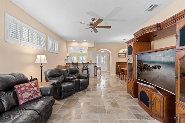 living room featuring ceiling fan