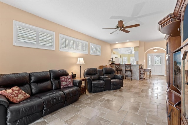 living room with ceiling fan