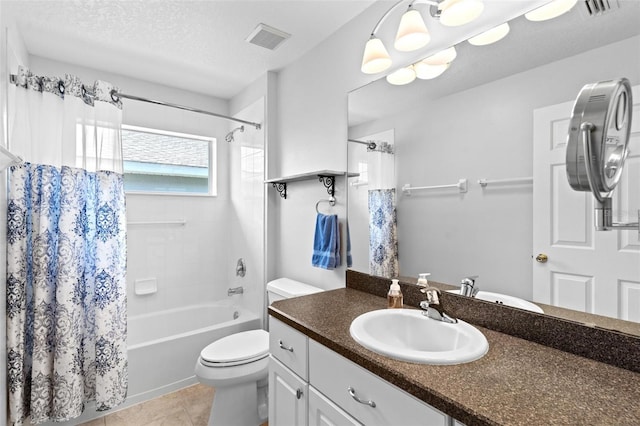 full bathroom with a textured ceiling, tile patterned floors, shower / tub combo with curtain, vanity, and toilet