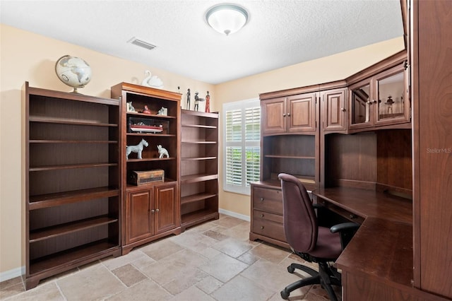 office featuring a textured ceiling