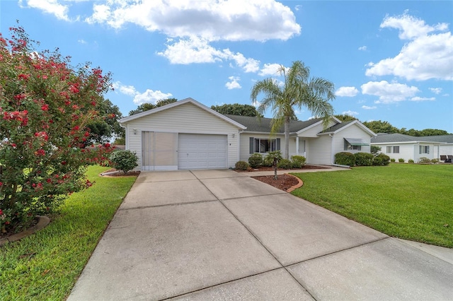 ranch-style home featuring a front yard and a garage