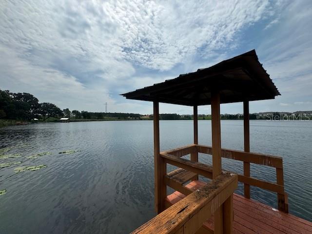 dock area featuring a water view