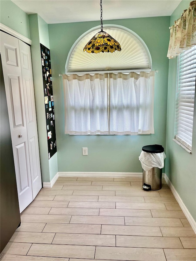 dining area with light hardwood / wood-style floors