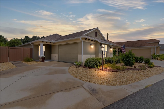 ranch-style house featuring a garage