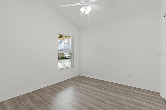 unfurnished room featuring high vaulted ceiling, light wood-type flooring, and ceiling fan