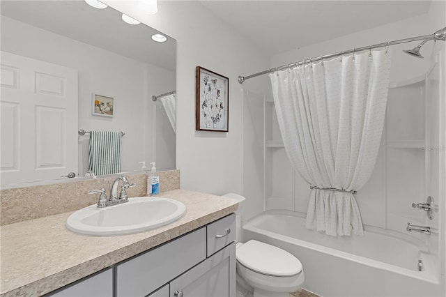 full bathroom with vanity, toilet, and shower / bath combo with shower curtain