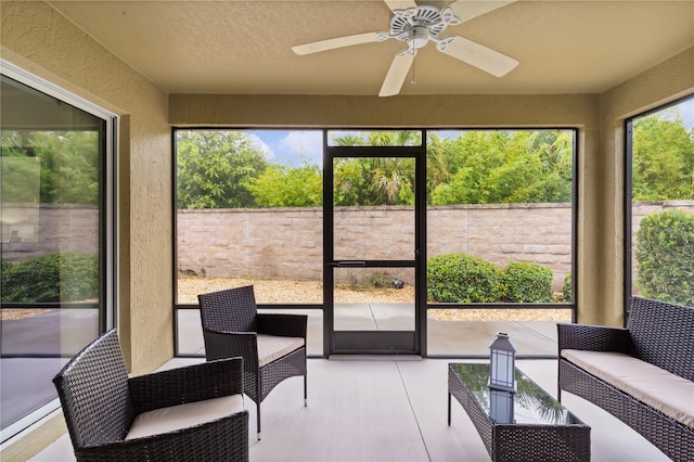 sunroom / solarium with ceiling fan