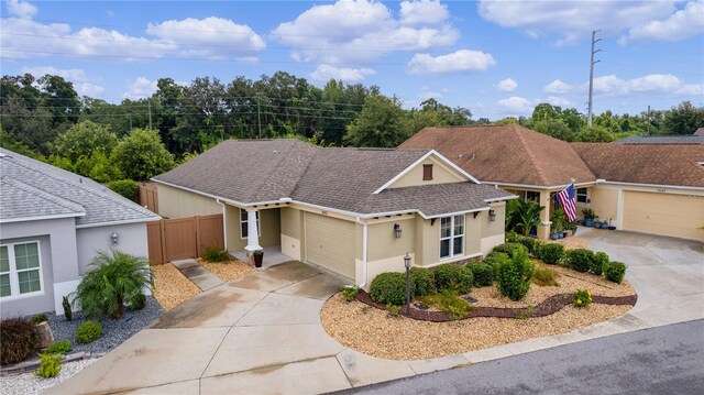 ranch-style home featuring a garage