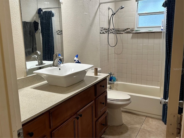 2524 Good Homes Rd, Orlando, FL 32818 - full bath featuring vanity, shower / bathtub combination with curtain, toilet, a textured wall, and tile patterned floors