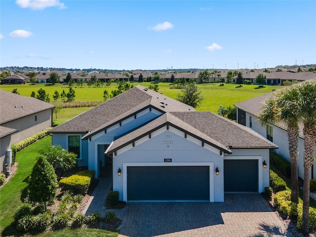 view of front of property with a garage