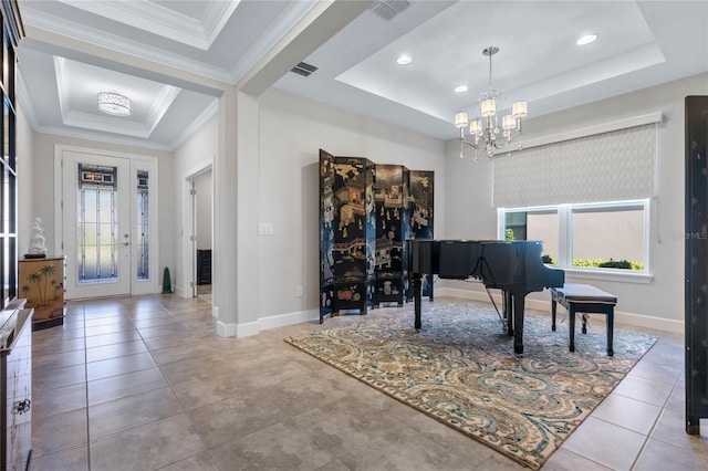 miscellaneous room with a raised ceiling, an inviting chandelier, tile patterned flooring, and a healthy amount of sunlight