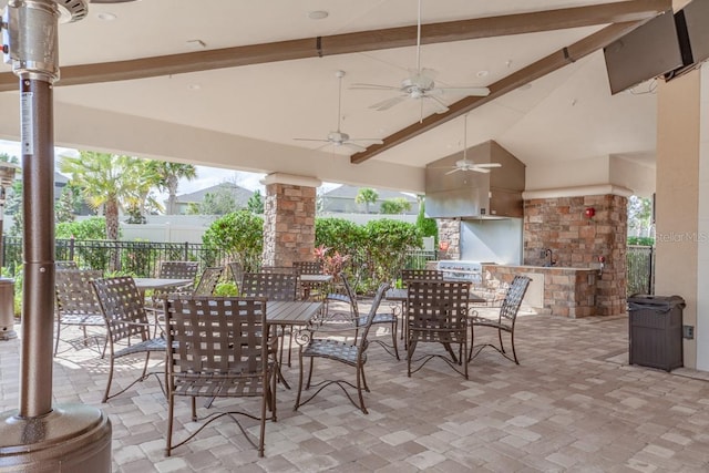 view of patio / terrace featuring ceiling fan