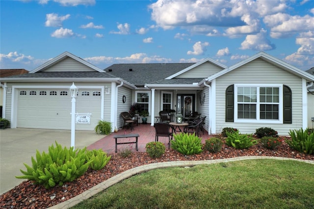 single story home featuring a garage