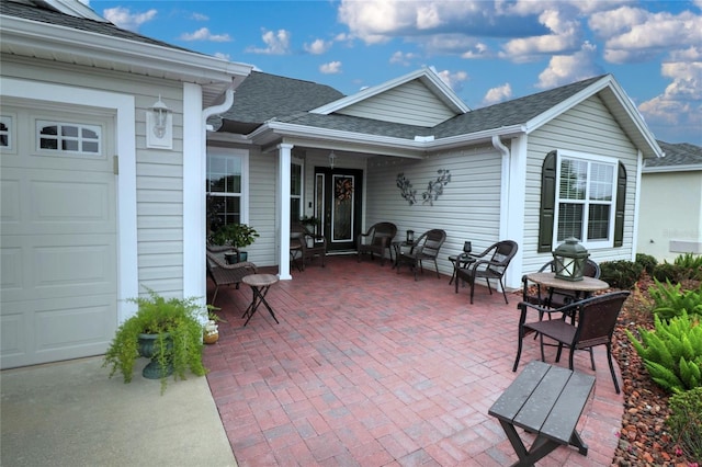 view of patio / terrace with a garage