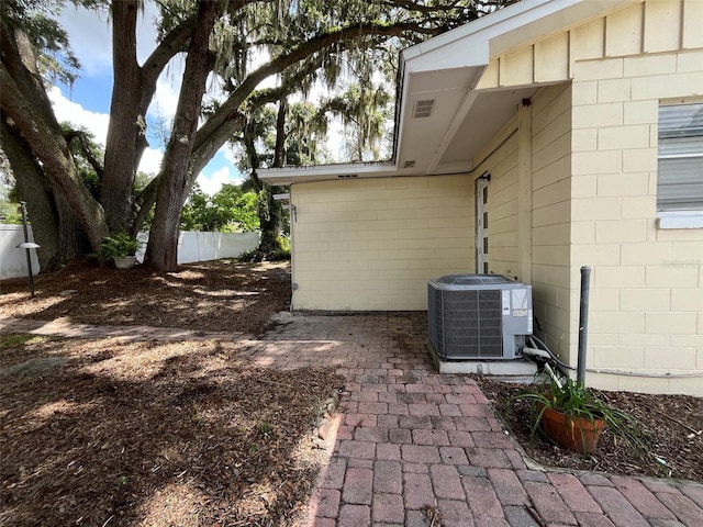 exterior space featuring central AC unit