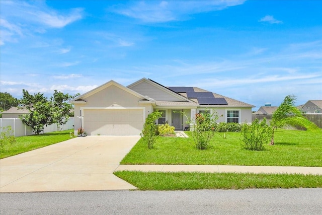 ranch-style house with a front lawn, solar panels, and a garage