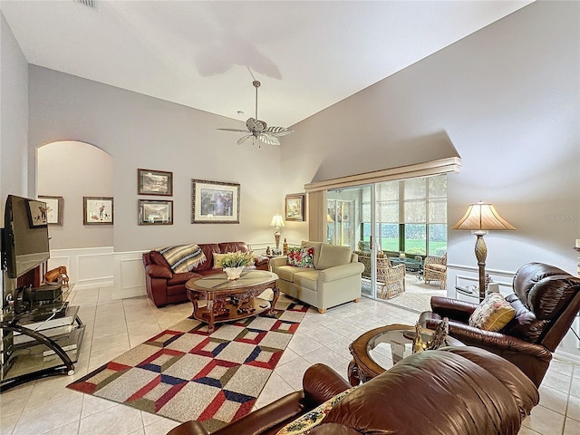 living room with ceiling fan and light tile patterned floors