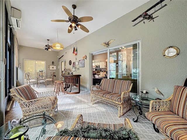 sunroom / solarium with ceiling fan and a wall mounted air conditioner