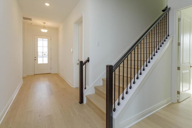 entrance foyer with light wood-type flooring