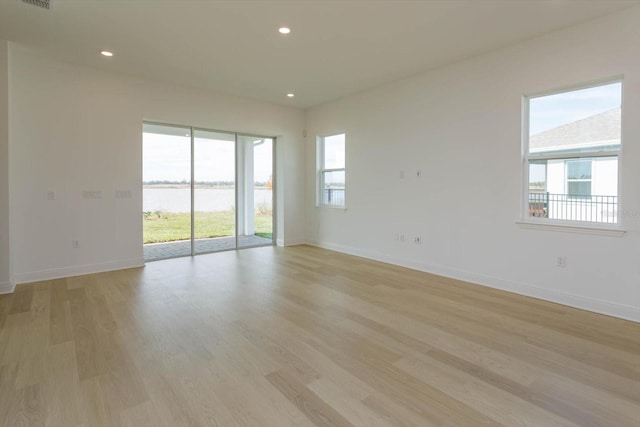 empty room featuring light hardwood / wood-style floors