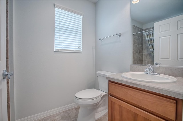 bathroom with tile patterned floors, walk in shower, vanity, and toilet