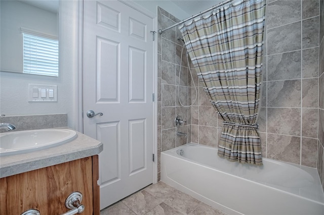 bathroom featuring vanity and shower / bath combo with shower curtain