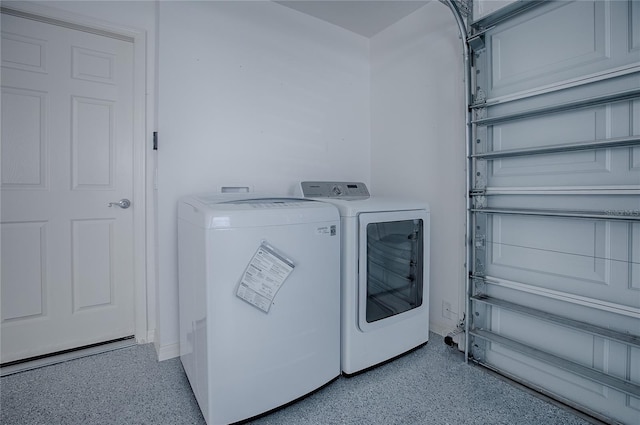 washroom with separate washer and dryer