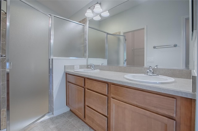 bathroom with vanity, tile patterned floors, and an enclosed shower