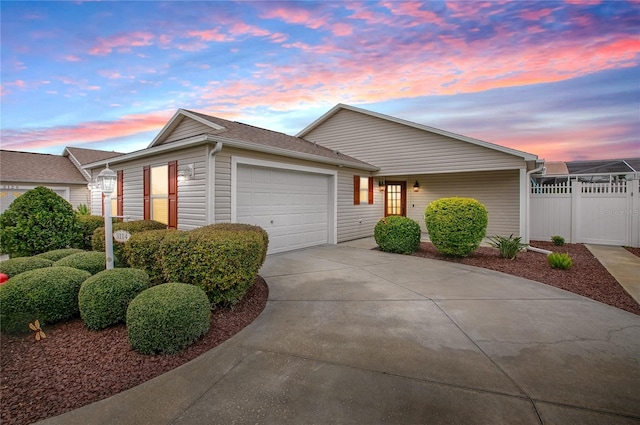 ranch-style home with a garage