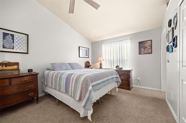 carpeted bedroom with lofted ceiling and ceiling fan